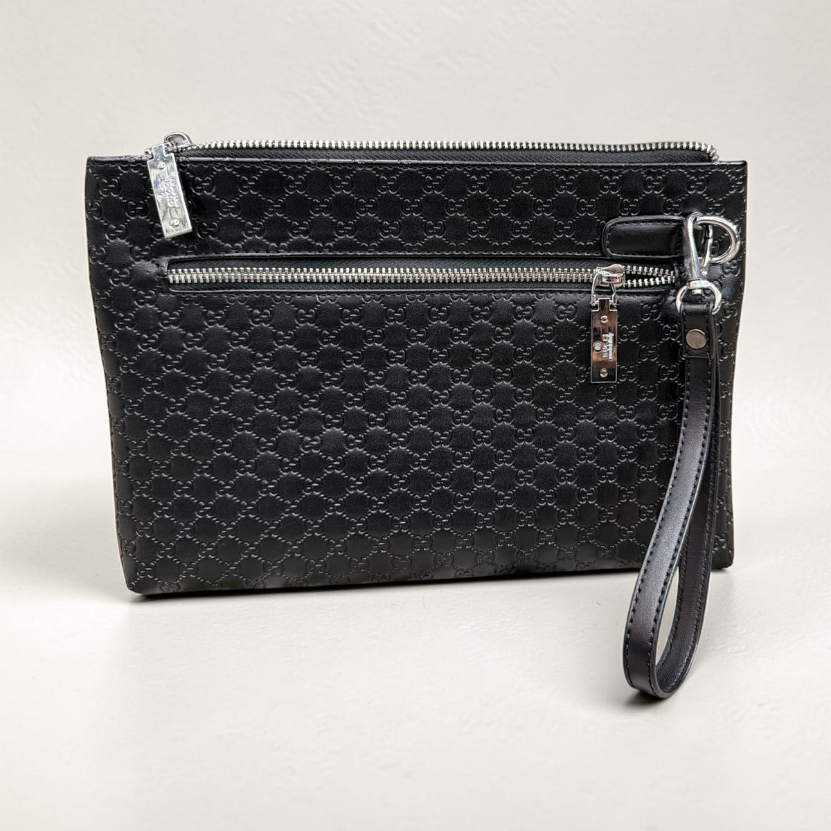 Black Embossed Wristlet Clutch Bag