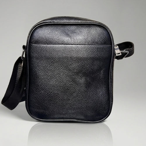 Black pebbled leather crossbody messenger bag with an adjustable strap.