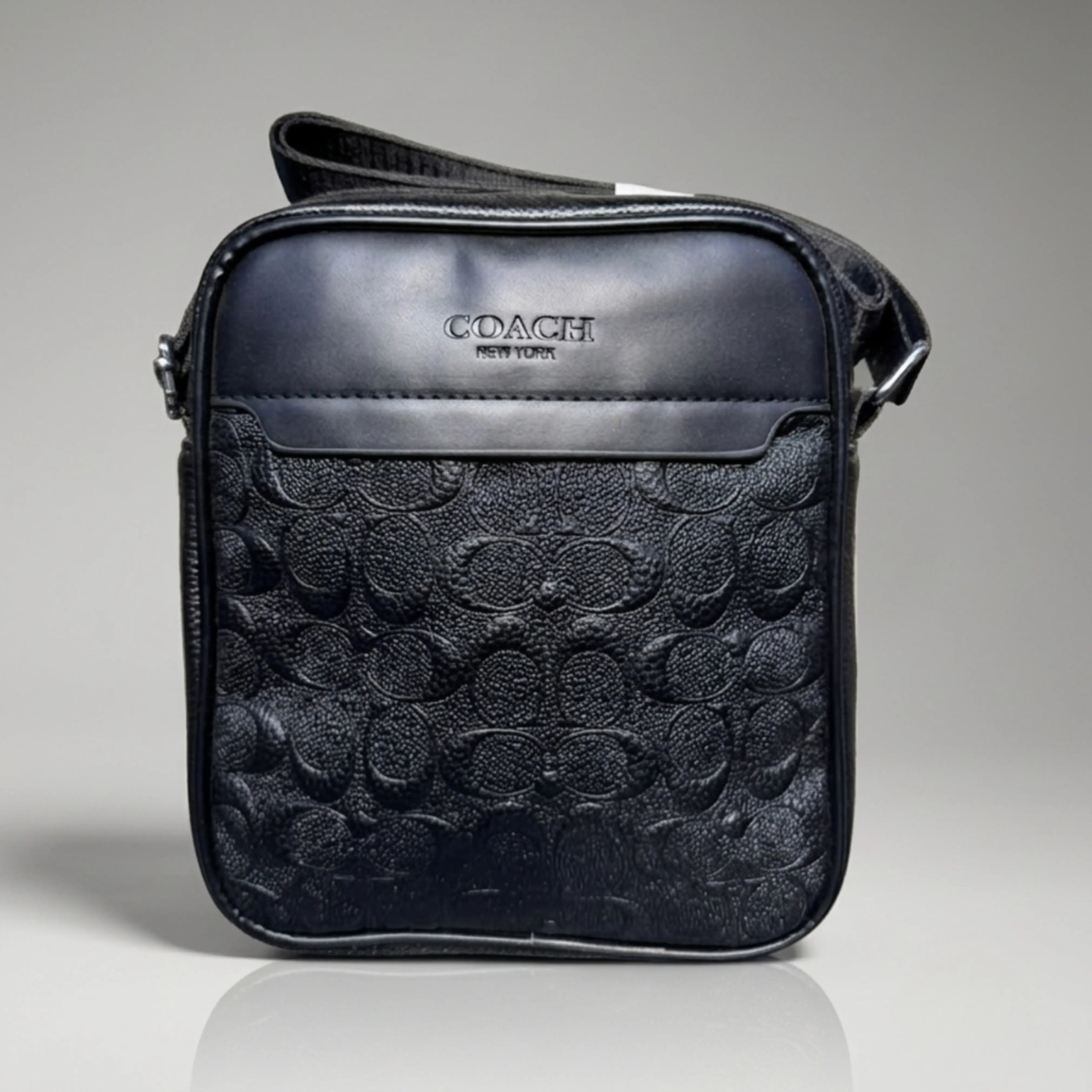 Coach Signature Embossed Leather Crossbody Bag