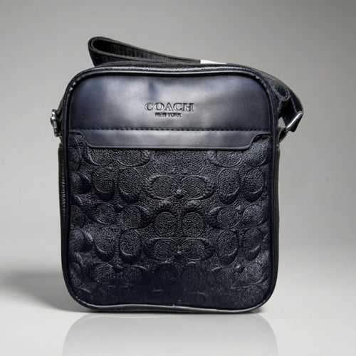 Coach Signature Embossed Leather Crossbody Bag