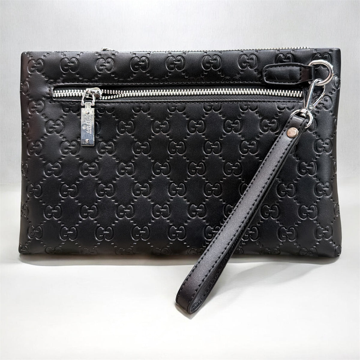 Black Embossed Monogram Wristlet Clutch Bag