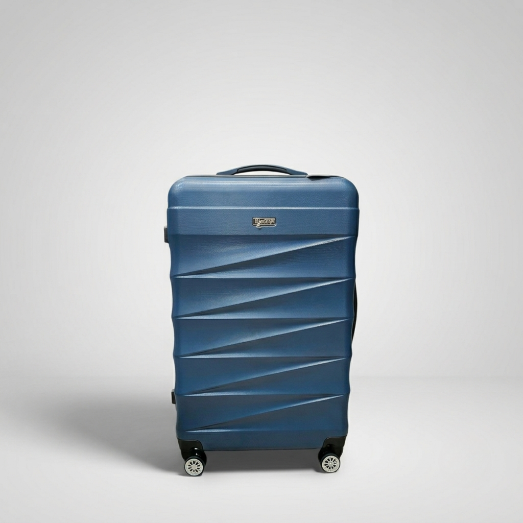 Unicare burgundy textured hard shell spinner trolley bag with geometric diagonal grooves.