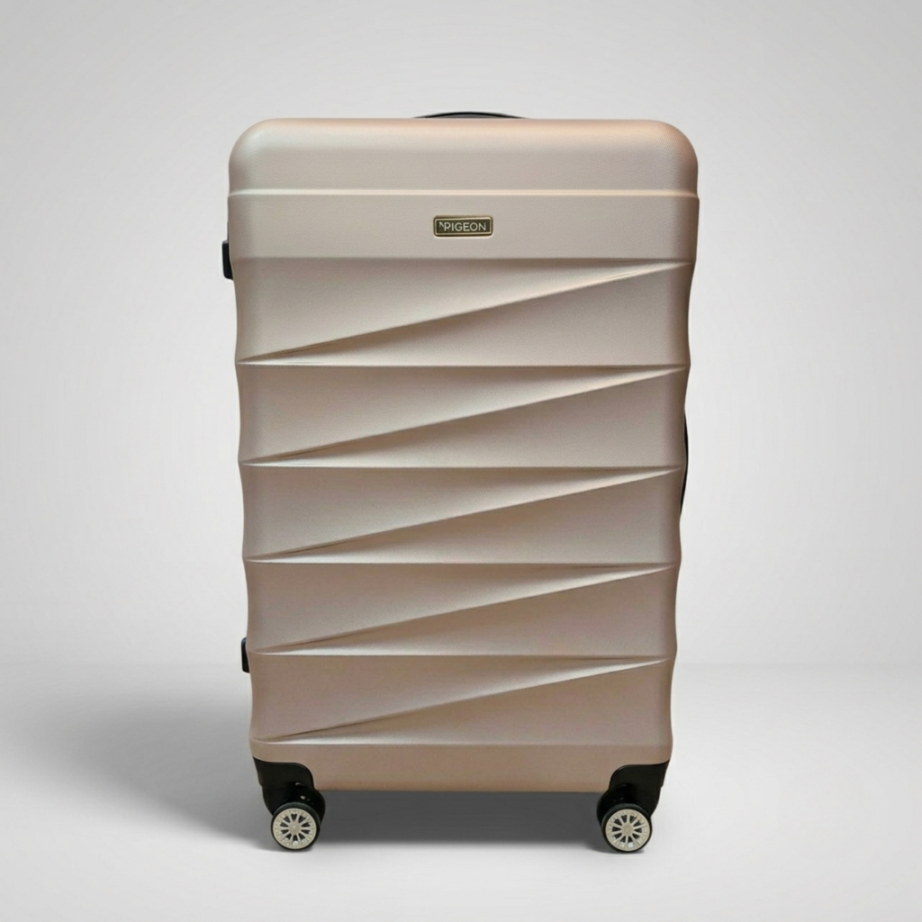 Unicare burgundy textured hard shell spinner trolley bag with geometric diagonal grooves.